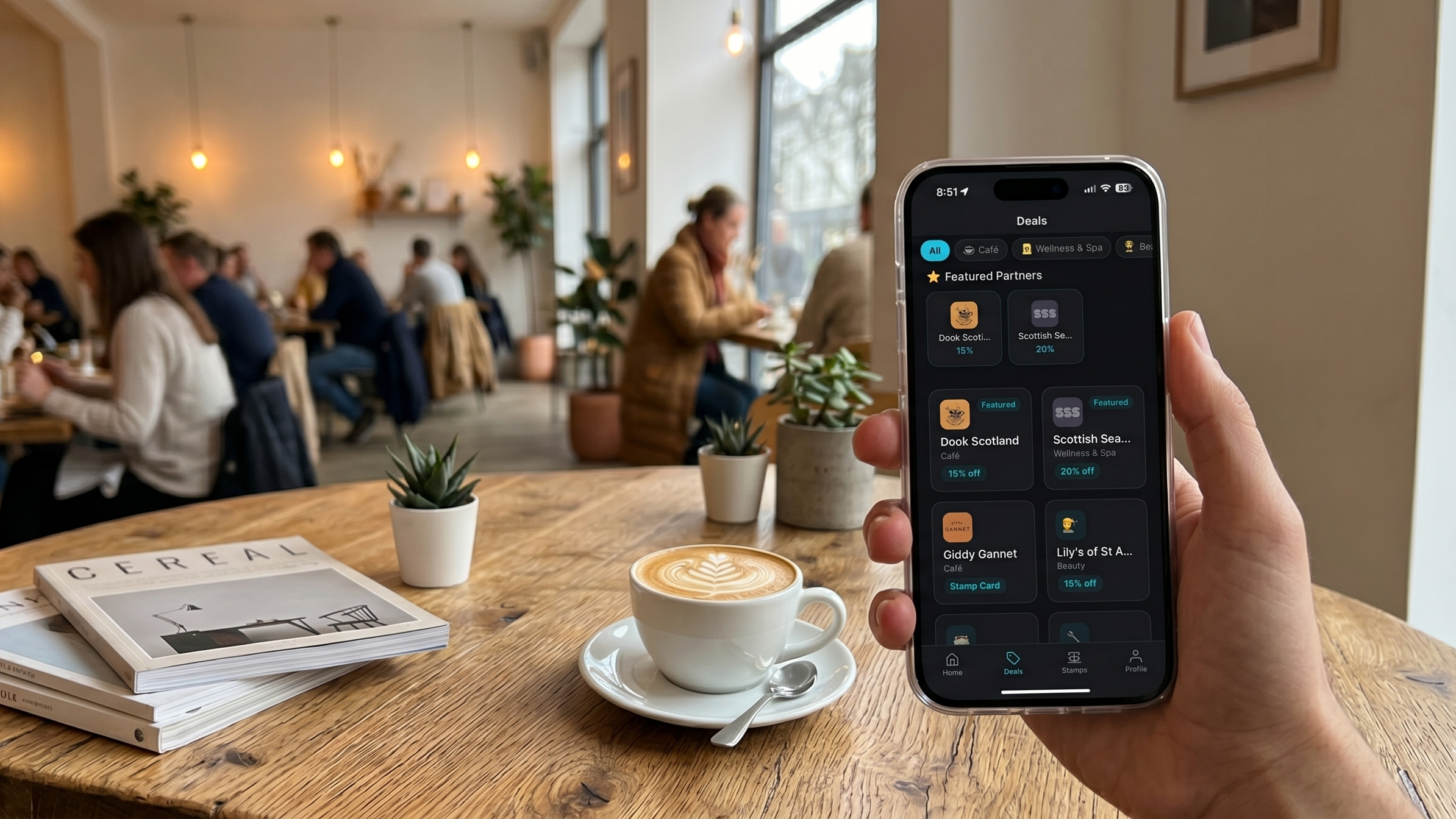 DUAL Perks app showing local deals in a cafe